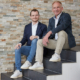 Uwe Burkhardt (rechts) hat seinen Sohn Philipp mit in die Geschäftsführung geholt, damit die Kunden des Unternehmens „auch weiterhin nahtlosen und erstklassigen Service“ von dem Großhändler erhalten (Bild: Reifen Burkhardt)